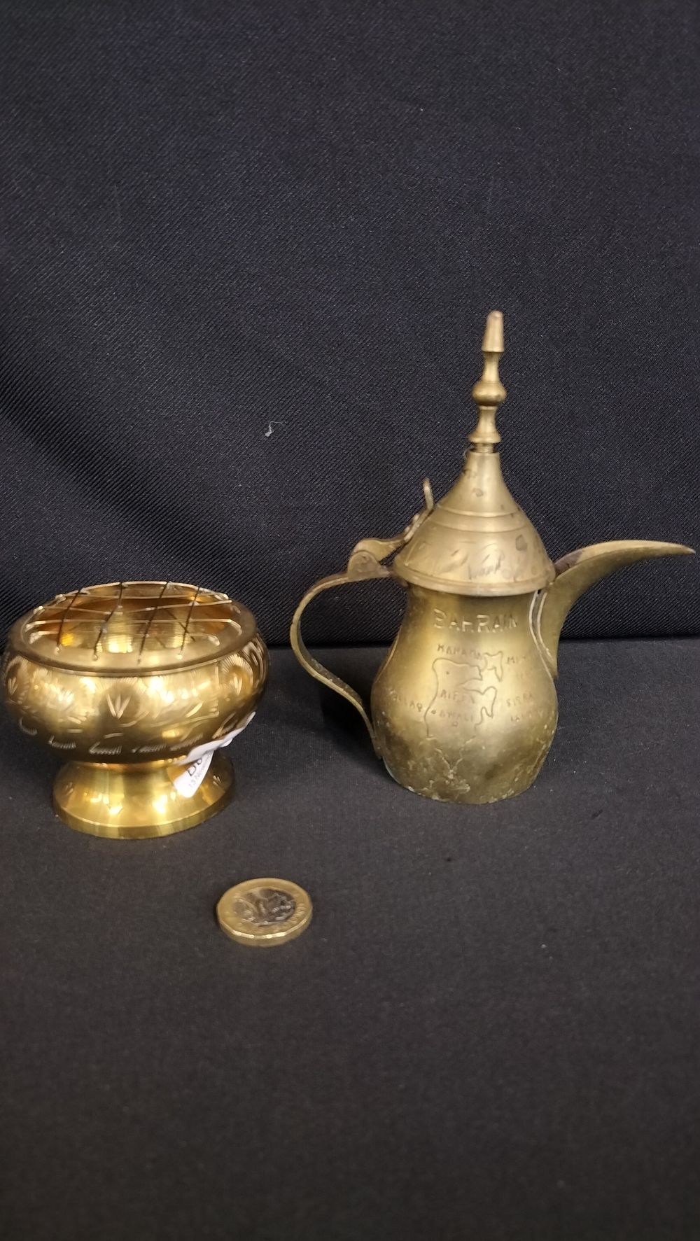 Lot 723: Two brass items a posy vase and a...