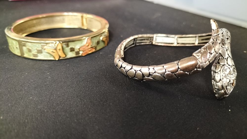 Lot 771: Two bangles. one is a snake  with crystals...