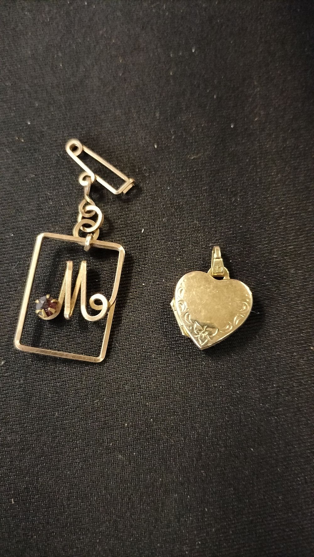 Lot 773: Two pendants one is a heart locket 9ct...