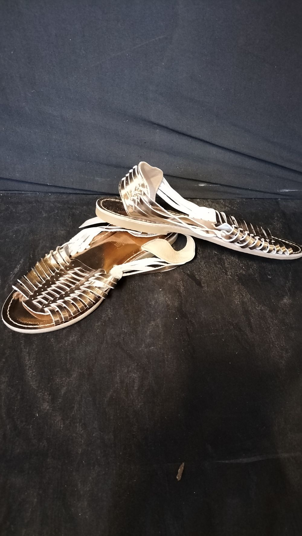 Lot 629: Brand new. Leather Collection Gold leather gladiator sandals....