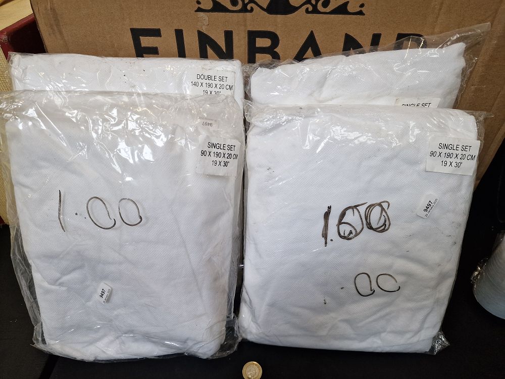 Lot 651: Four Mattress Covers. Three Single, One Double