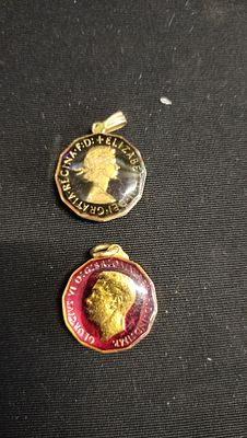 George VI 1942 enameled three pence. And a Elizabeth II 1967 enameled Three Pence Pendants