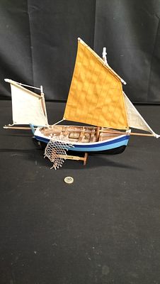 Wooden Model of the Lugger Sail boat. Measures approx 32 x 42.5 cm