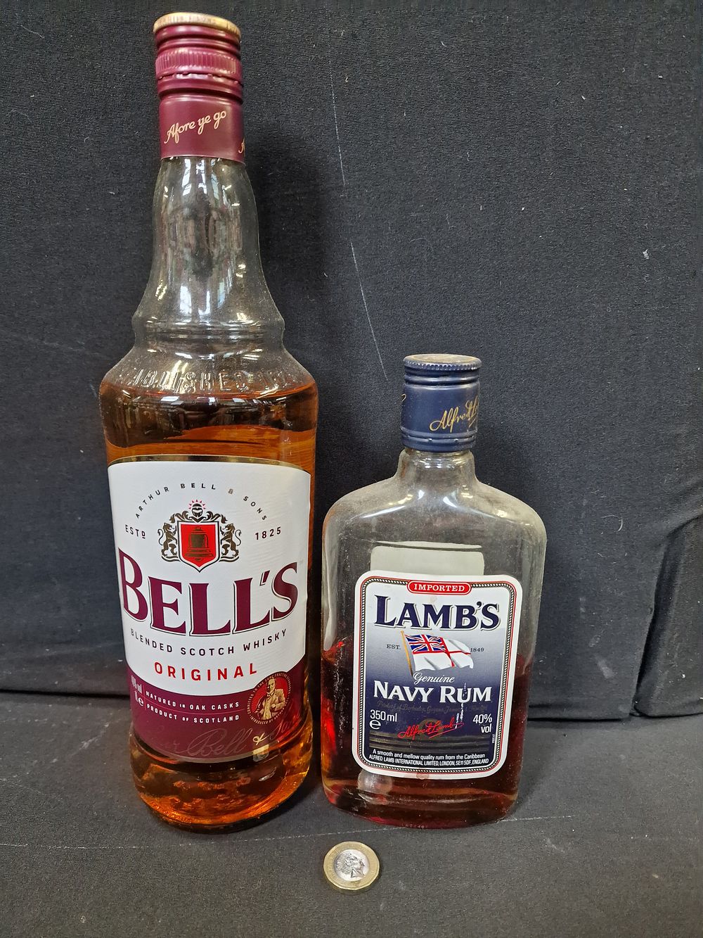 Lot 218: Bells Whisky and Lambs Navy Rum. Both have been opened COLLECTION ONLY