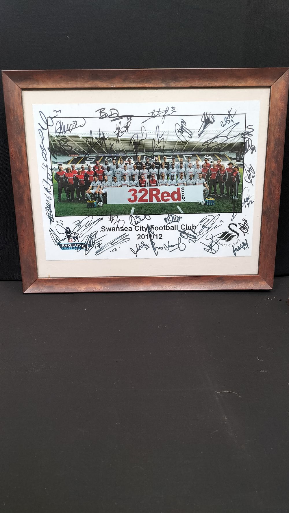 Lot 272: Framed Print of Swansea City Football Club 2011/12...