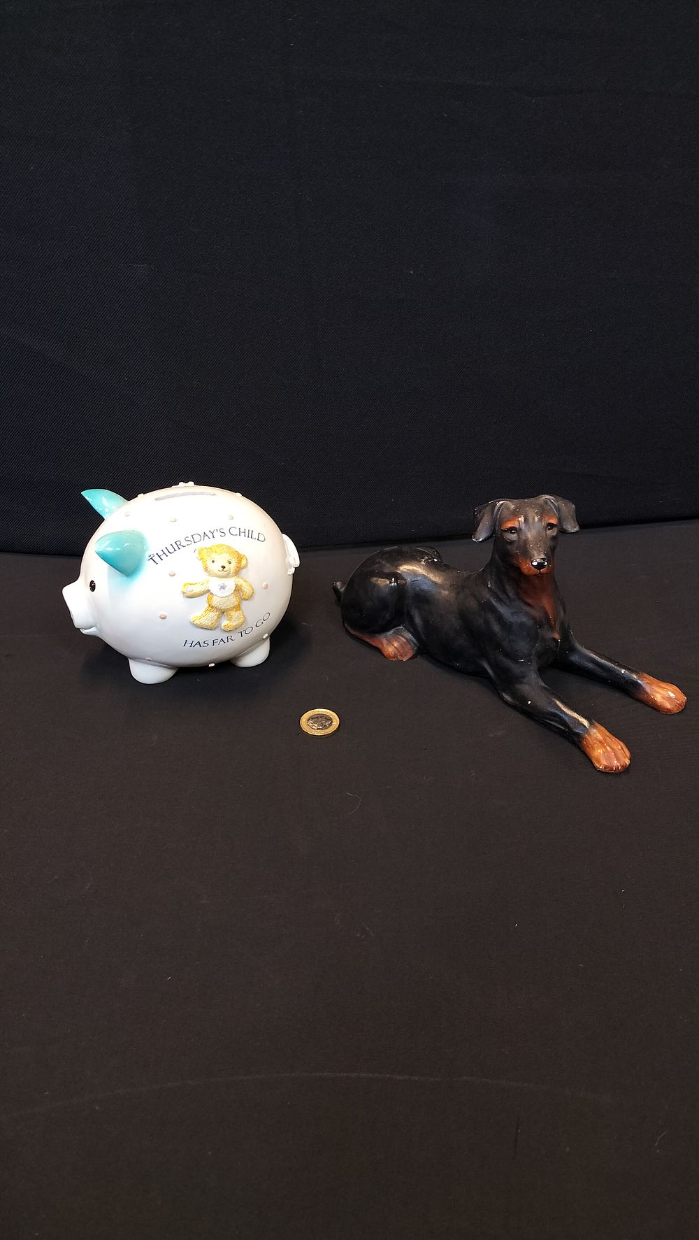 Lot 303: Thursday's Child Piggy Bank, and a Doberman Chalkware...