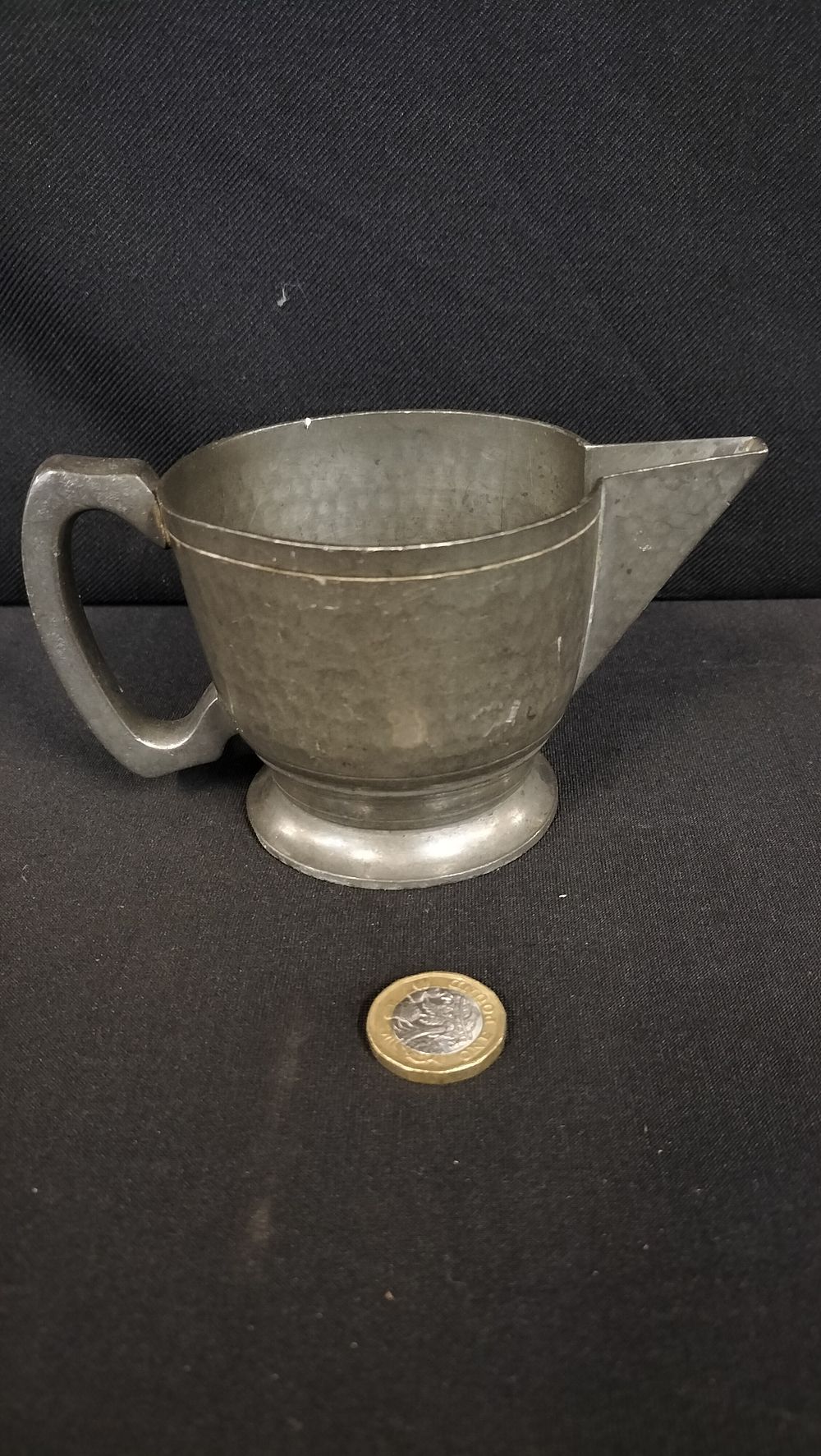 Lot 313: Craftsman hammered Cramer jug  