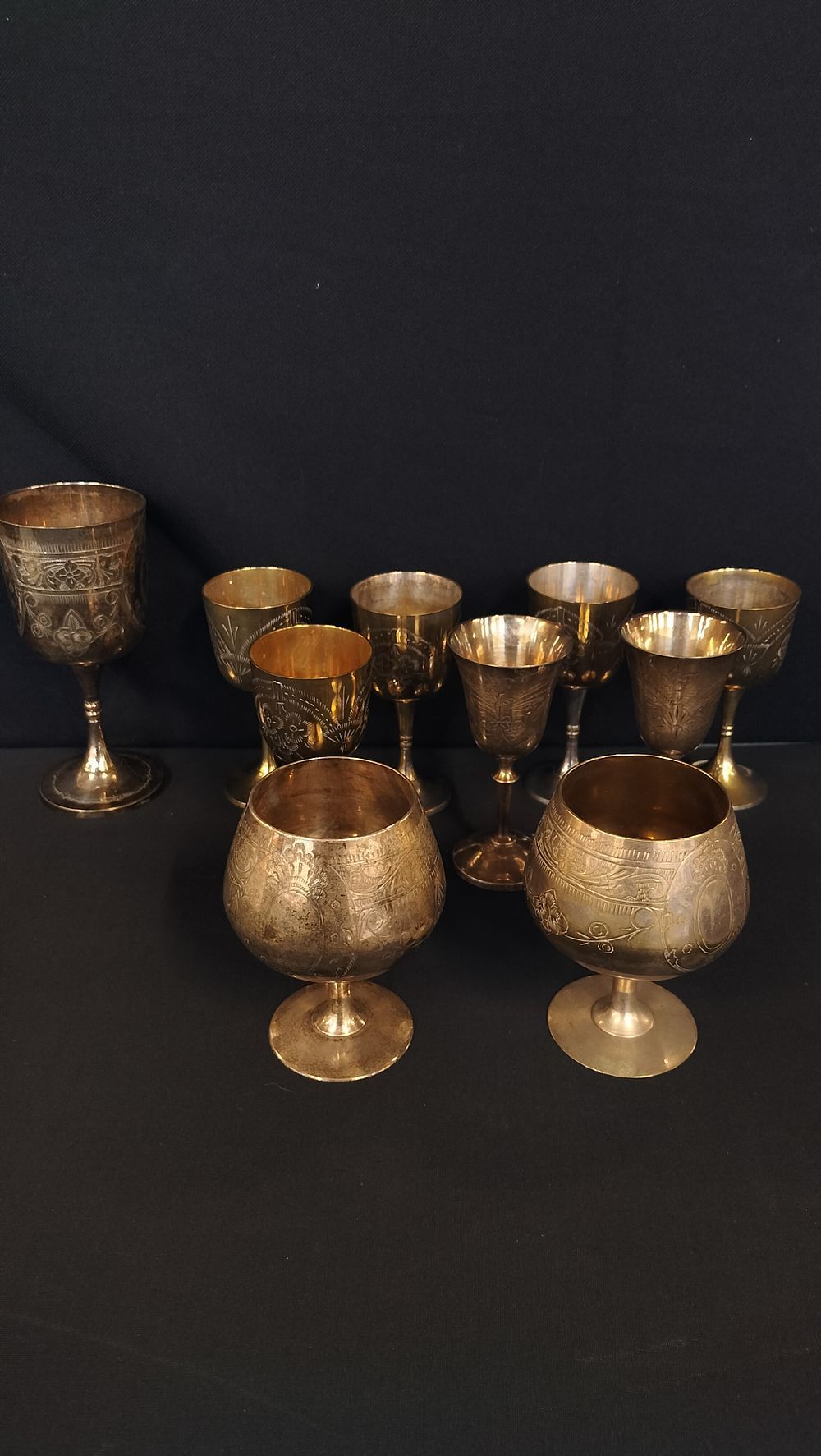 Lot 314: 10 various silver plated goblets, 2 brandy glasses...
