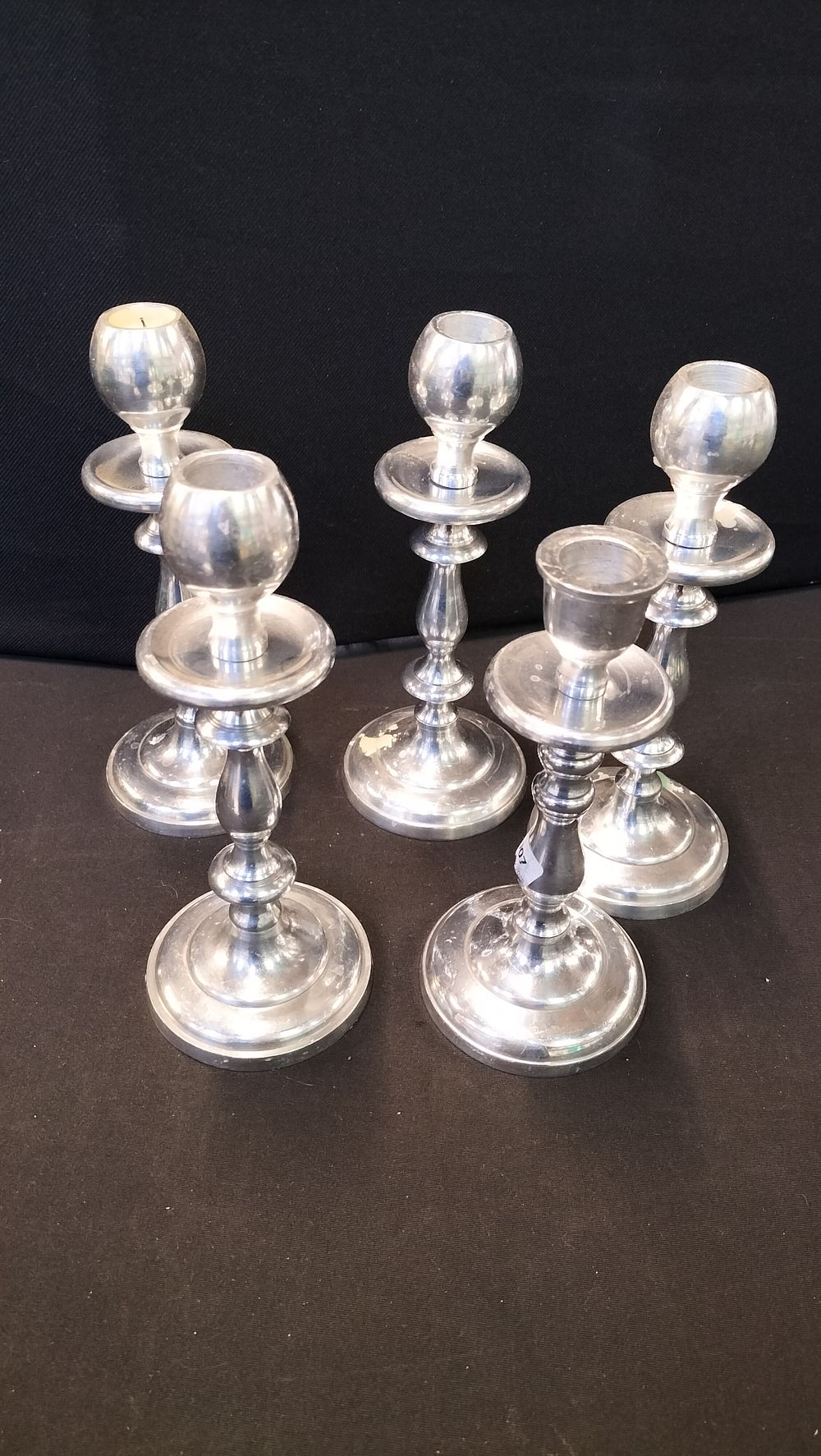 Lot 318: 5 Silver Tone Candle Sticks 