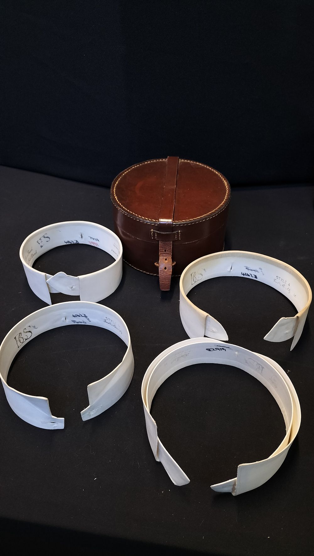 Lot 365: Brown Leather Collar Case with 4 Collars 