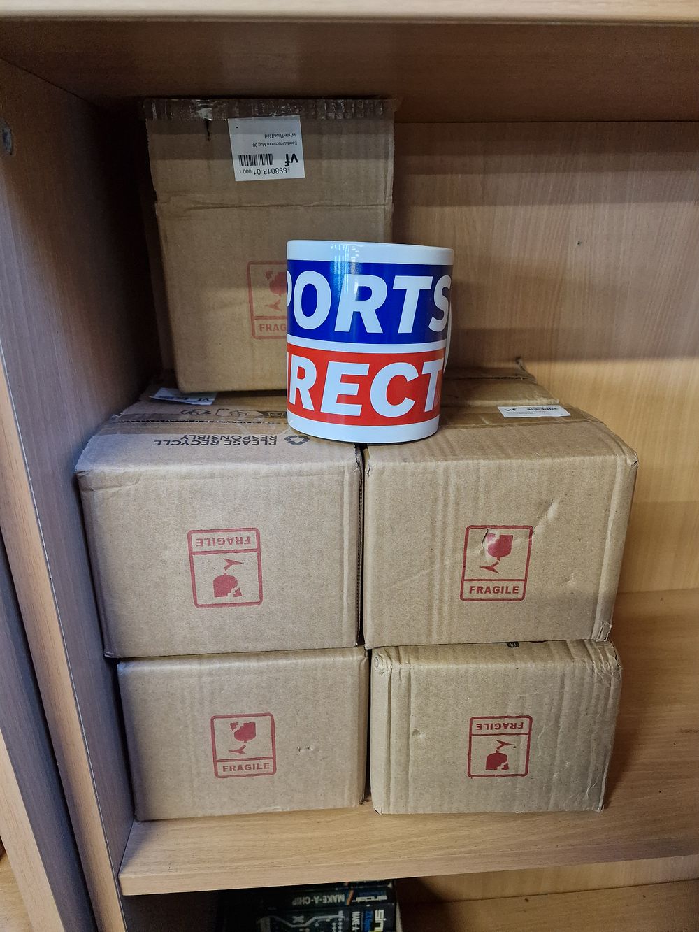 Lot 389: x9 Sports Direct Mugs