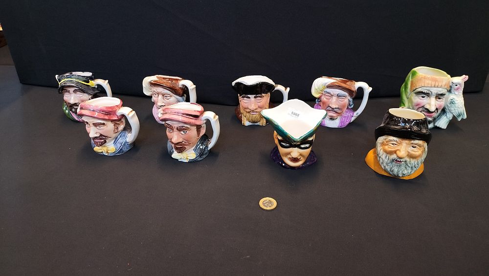 Lot 378: 9 Character Jugs including Staffordshire Pottery Highway Man...