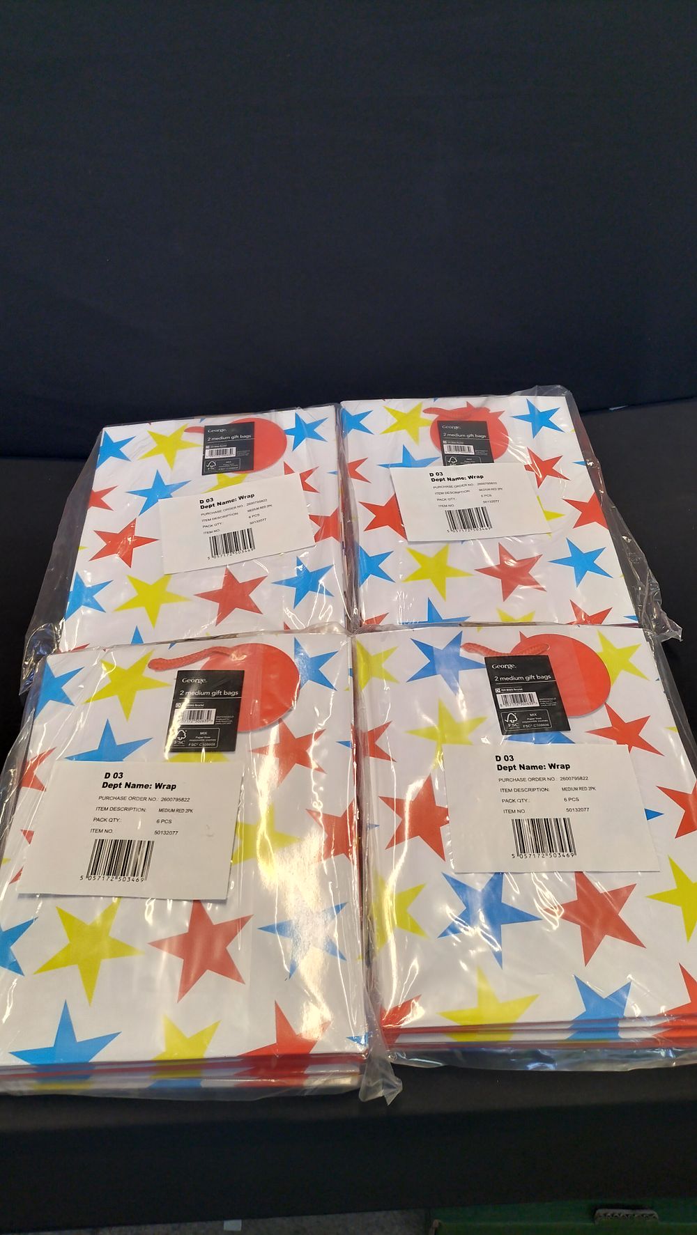 Lot 398: 4 packs of 6 Medium George Gift Bags 
