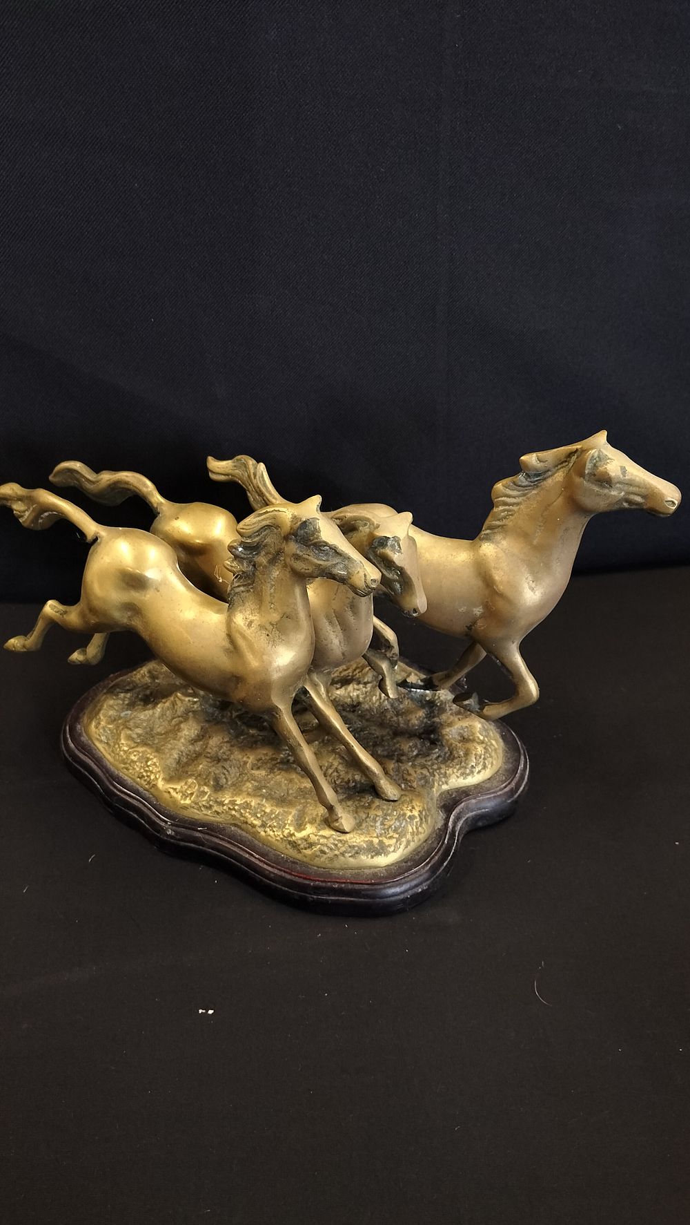 Lot 552: Brass Ornament of Three Horses on Wooden Base