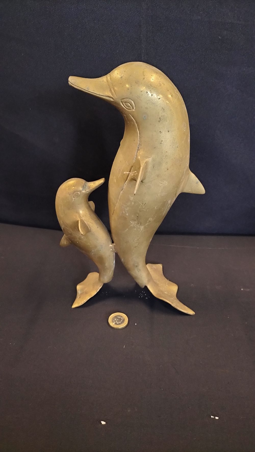 Lot 554: Two Brass Dolphins 