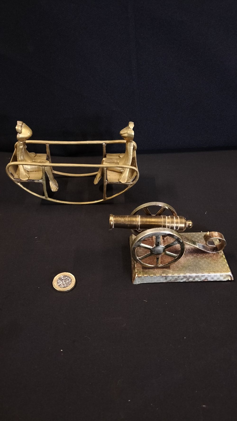 Lot 557: Brass Frogs on a Rocking Seats and a...