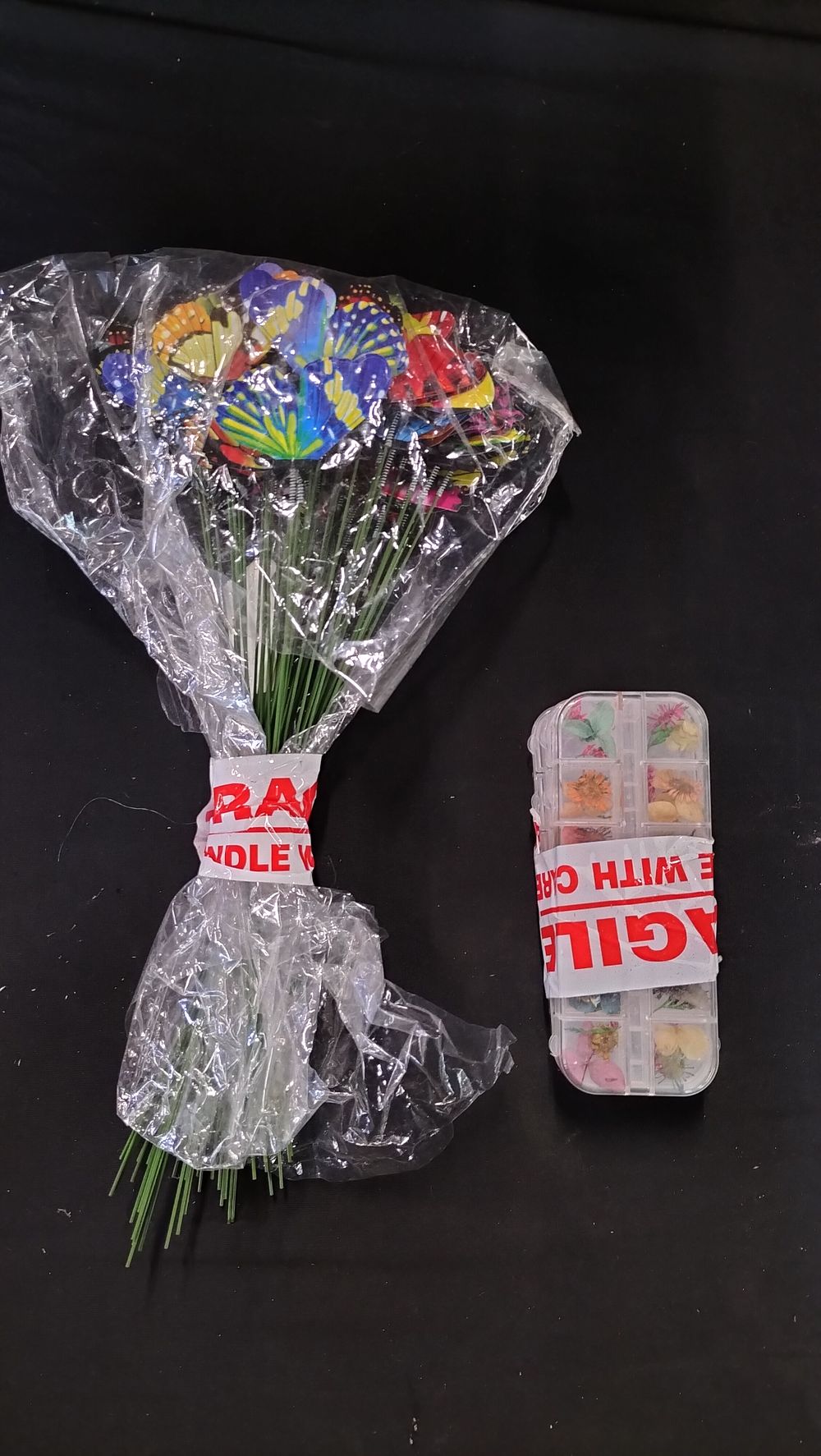 Lot 661: Faux Butterfly Spring decorations and Three Tubs of...