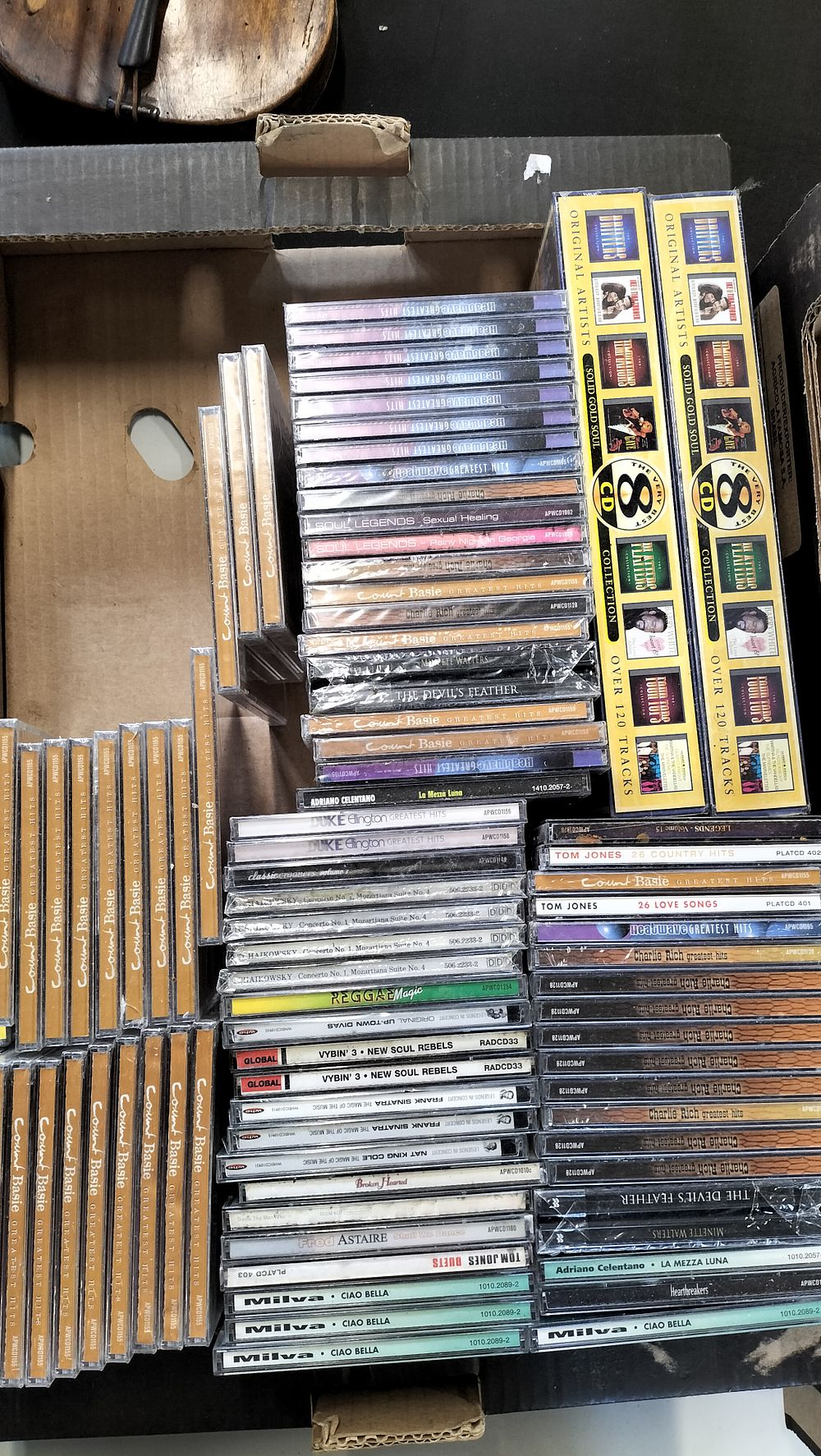 Lot 674: Two boxes of Mixed CD's and Audio Tapes...