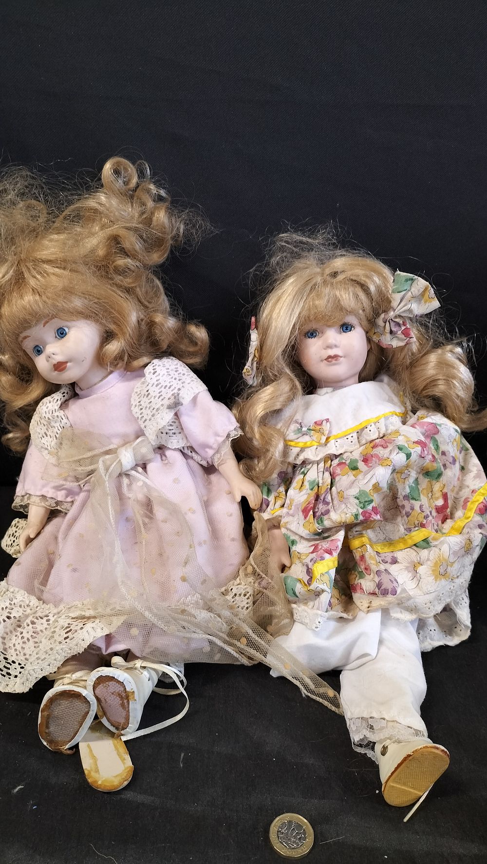 Lot 683: Two vintage porcelain dolls. One has damaged leg. 