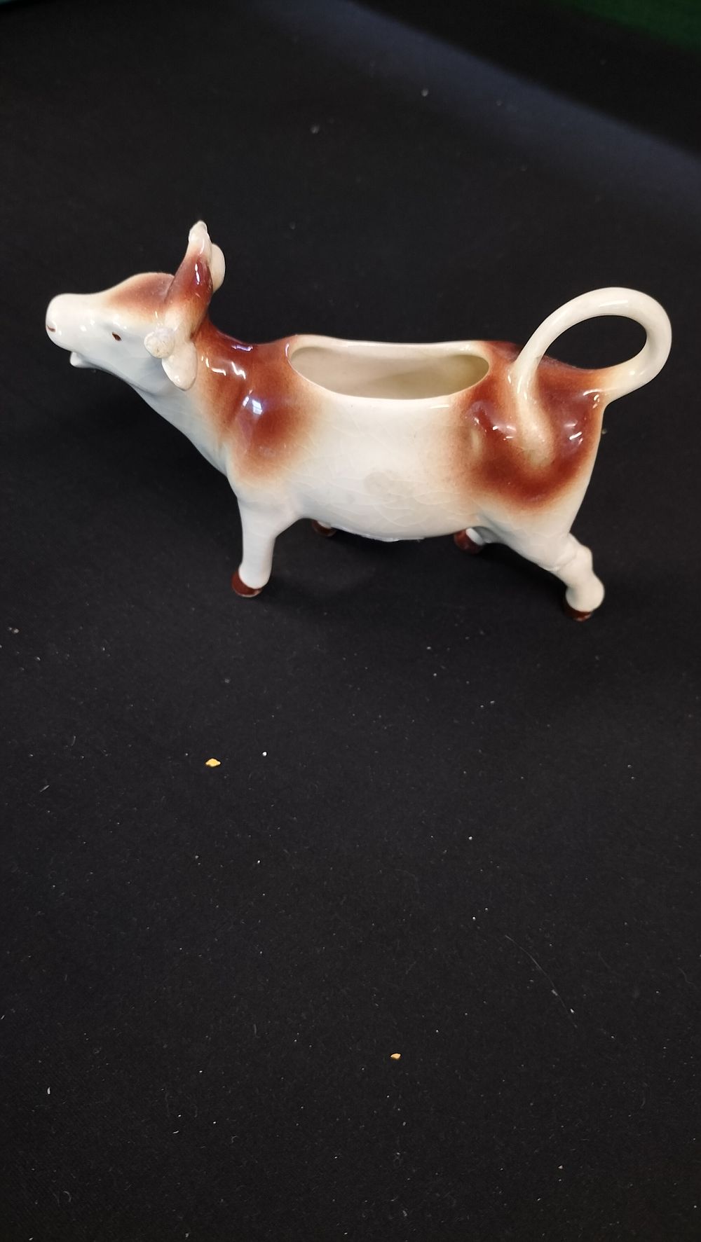 Lot 689: Creamer cow jug