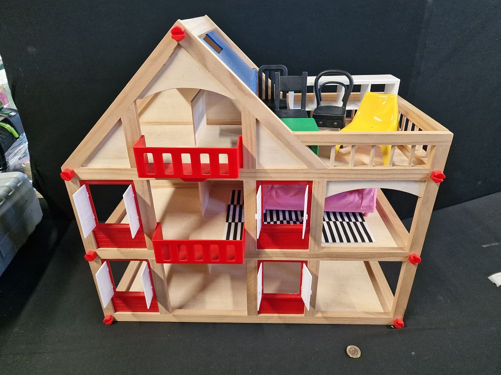 Lot 201: Young Childs Dolls House with Some Furniture COLLECTION ONLY