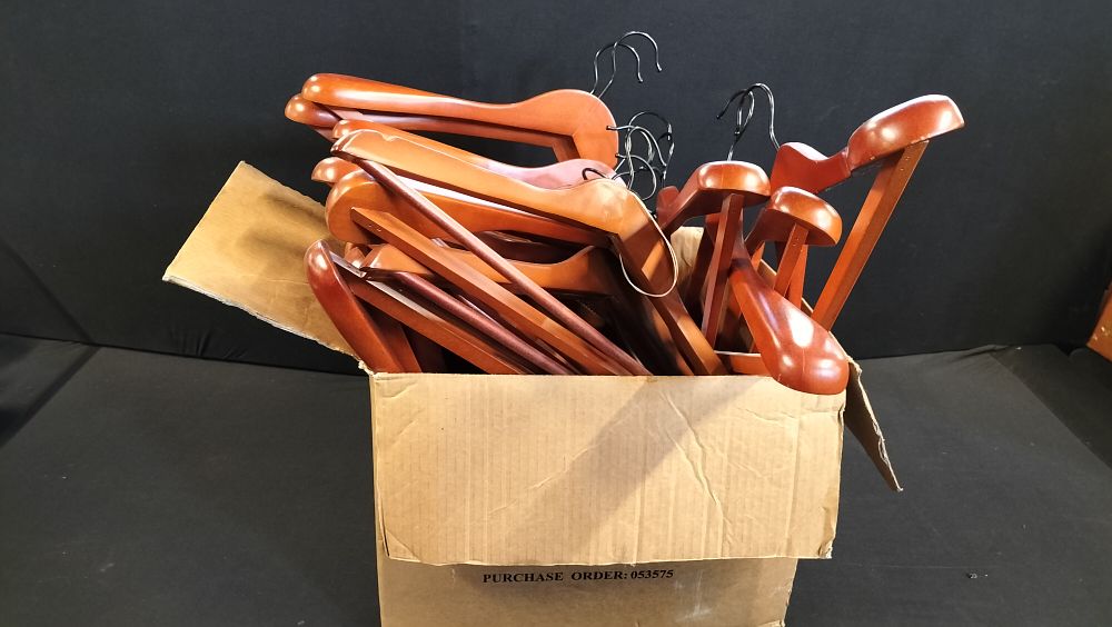 Lot 244: Box of 27 wooden Coat Hangers 