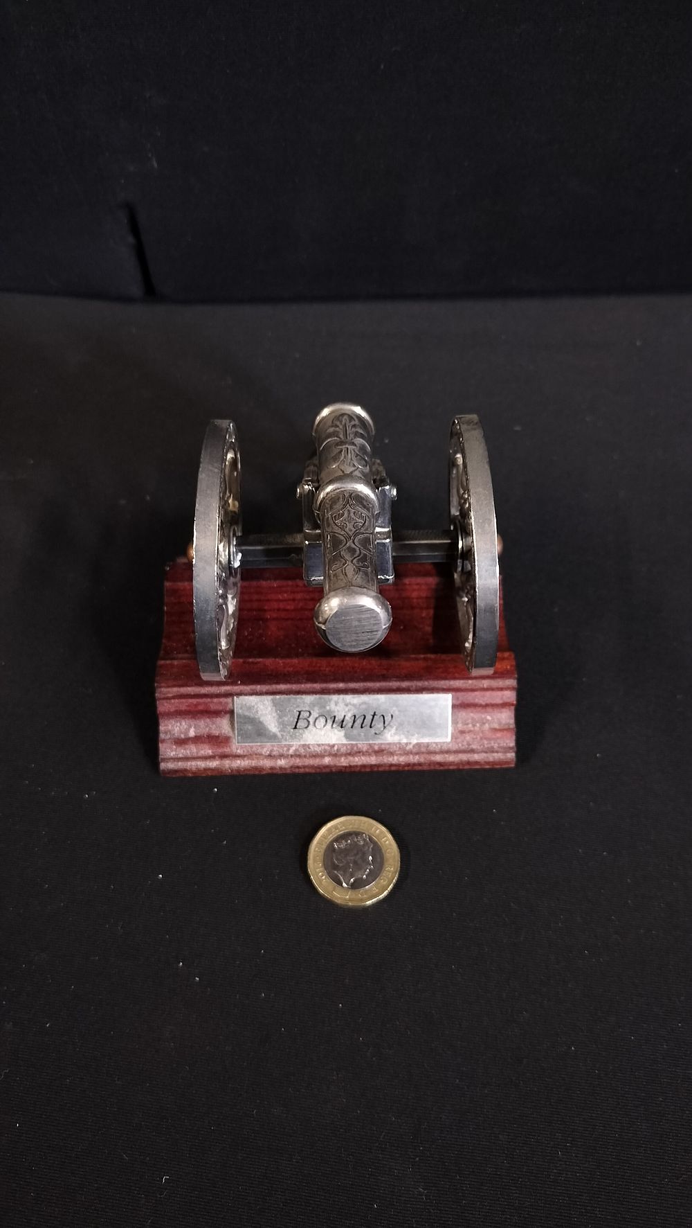 Lot 297: Bounty Cast Metal Canon on Stand. Measures approx...