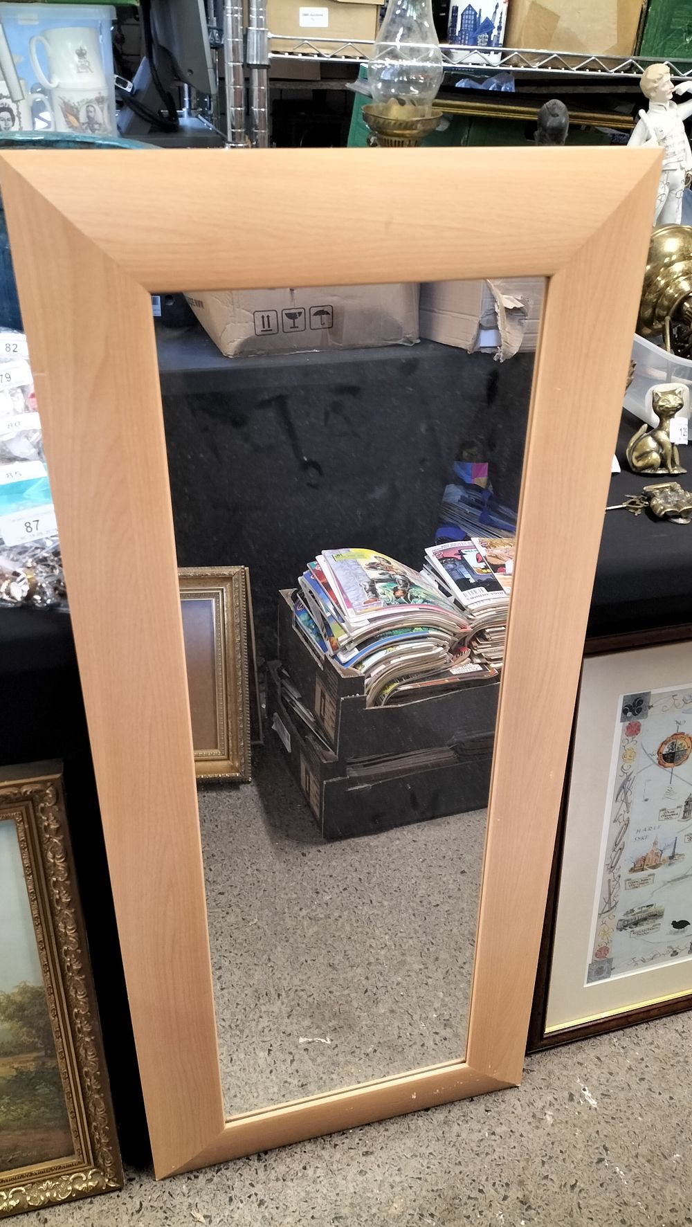 Lot 313:  Tall Mirror With Pine Coloured surround . Measures...