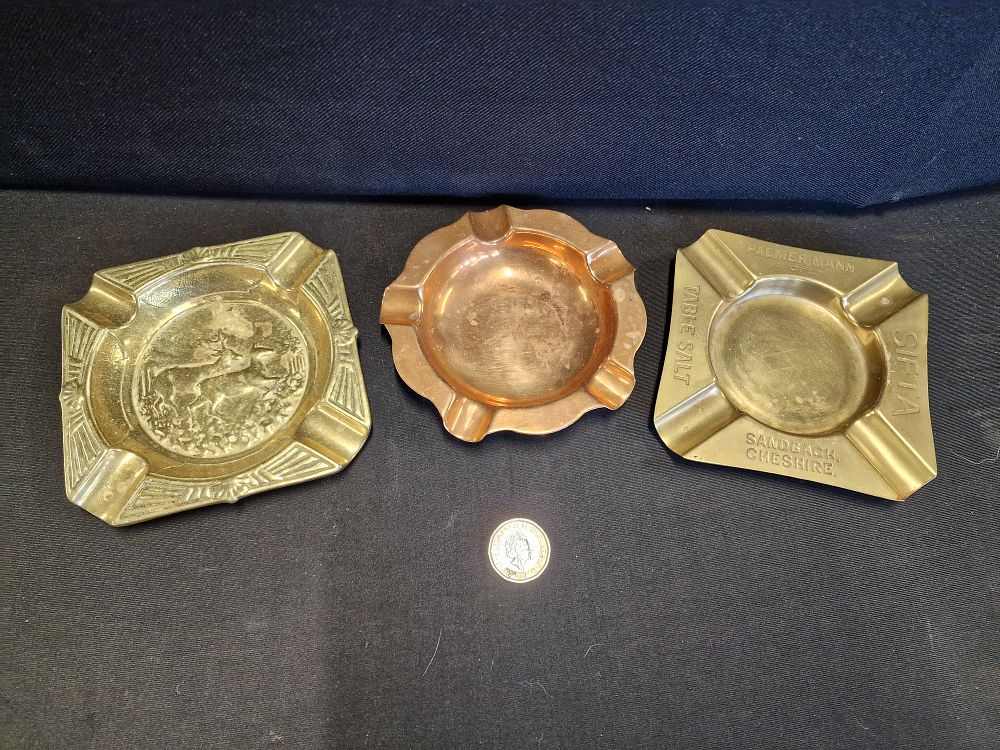 Lot 555: Three Vintage Brass and Copper Ashtrays