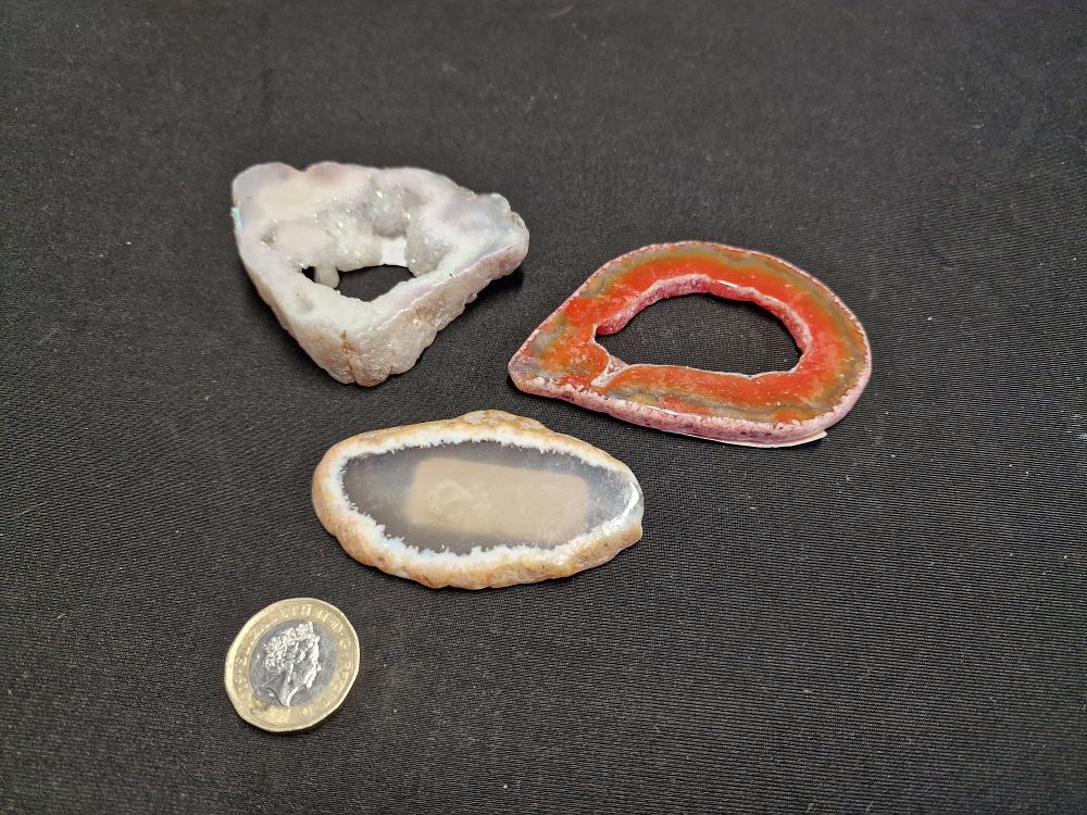 Lot 576: Three Crystal Samples. Aura Titanium Quartz 67g, Dyed Agate 34g and Agate Slab 25g