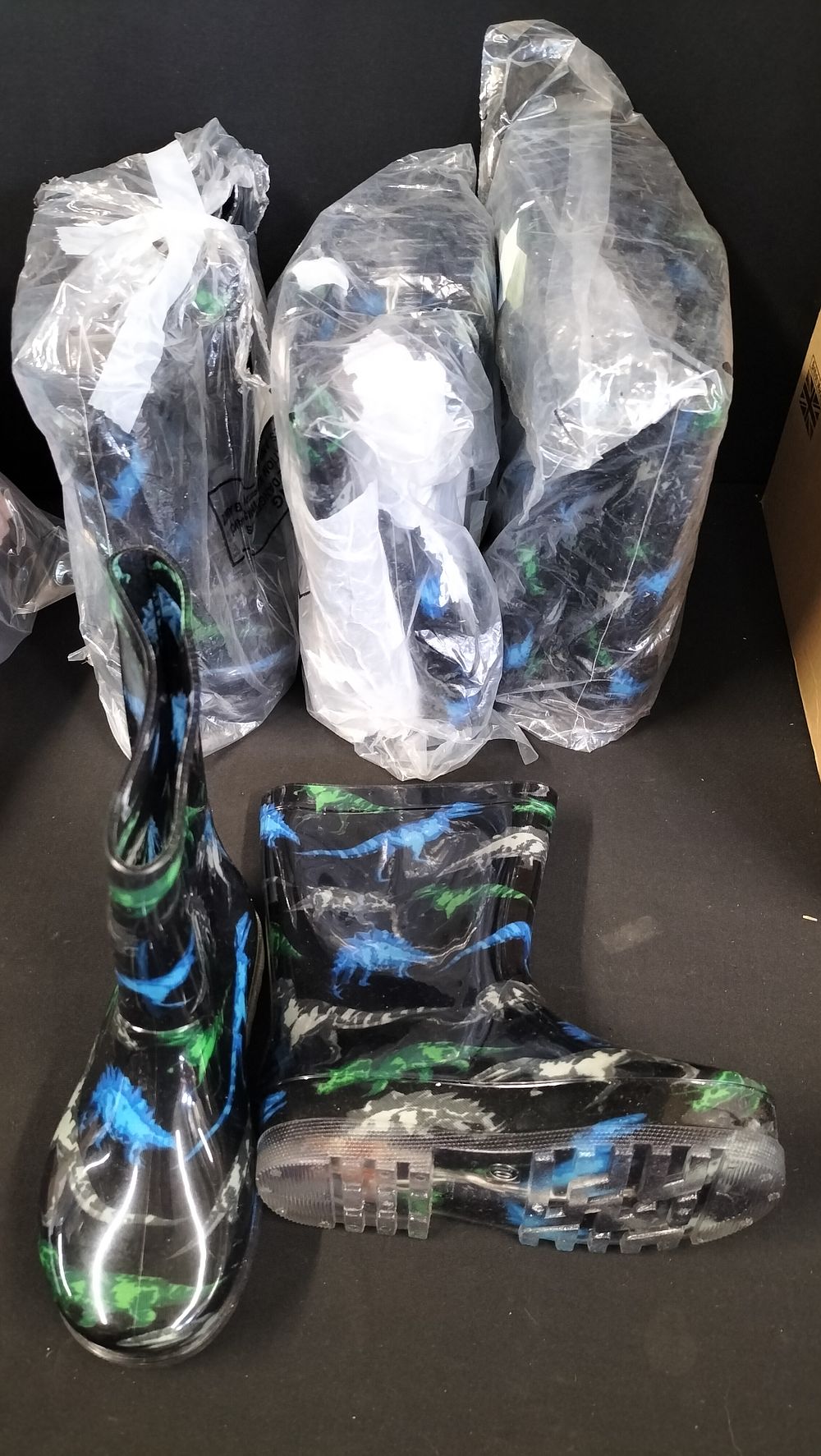 Lot 375: Four Pairs Of Children's Dinosaur Light Up Wellington...