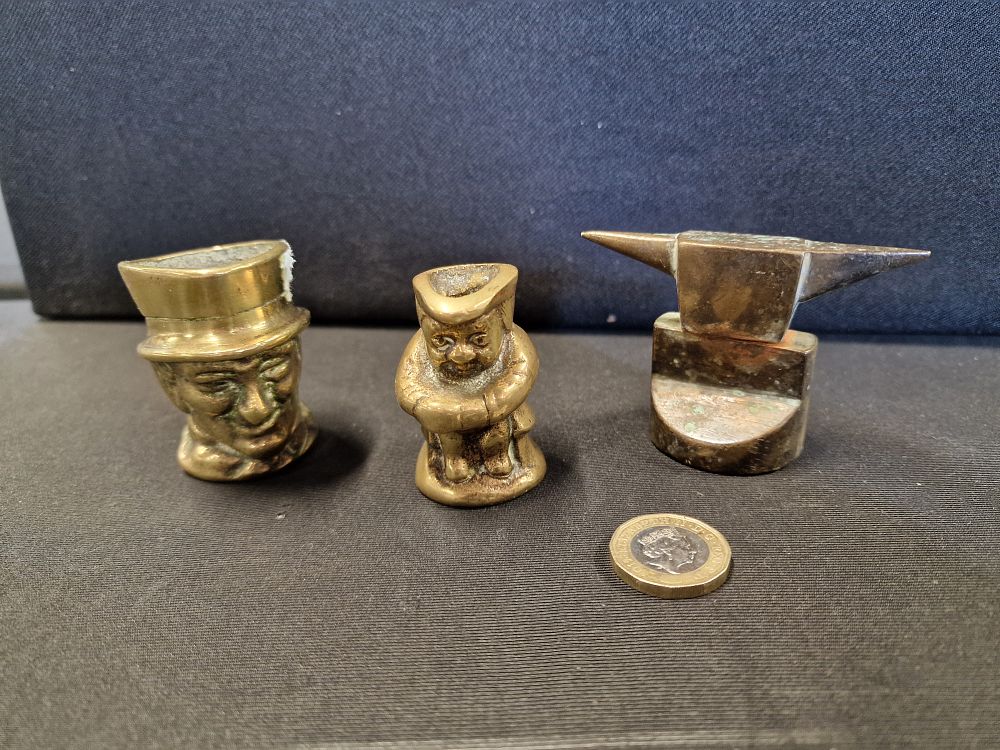 Lot 603: Vintage Mini Brass Toby Style Jugs and Anvil