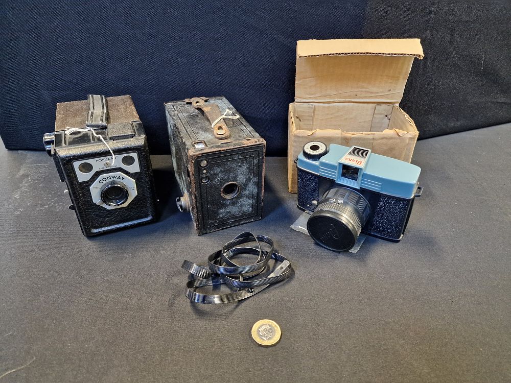 Lot 619: Three Vintage Cameras