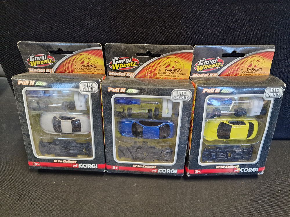 Lot 626: Three Corgi Wheelz Die-Cast Model Kits