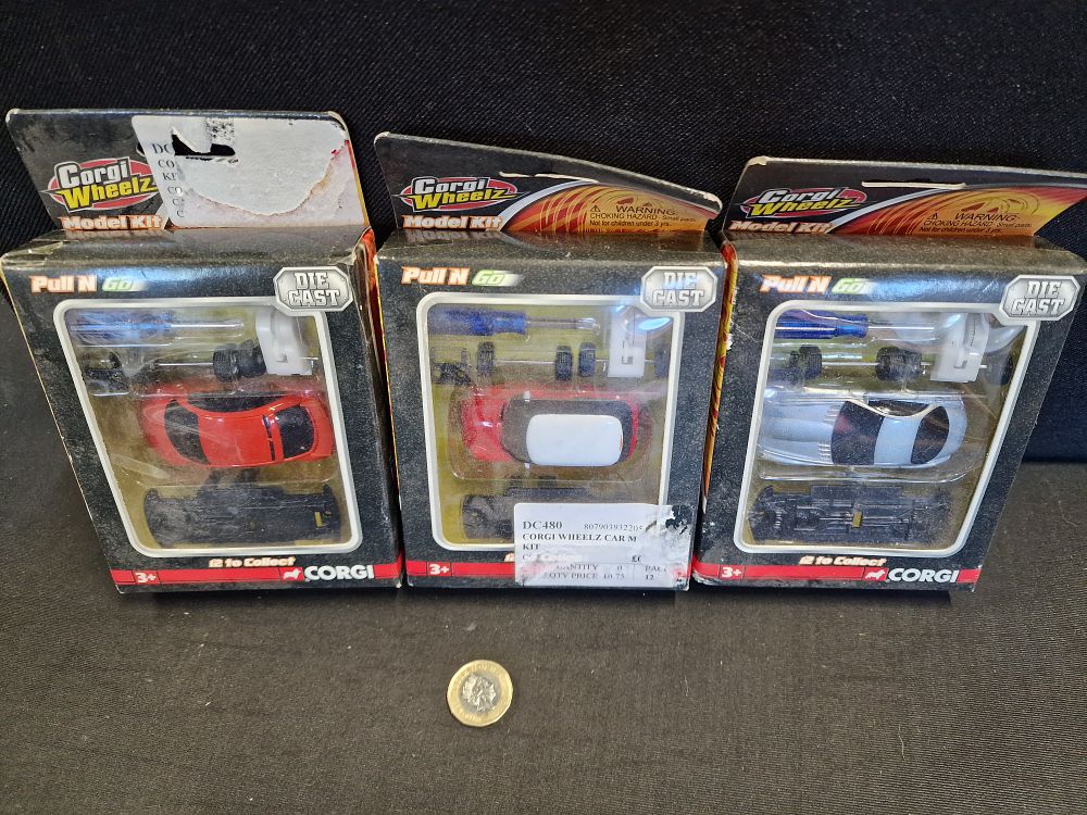 Lot 628: Three Corgi Wheelz Die-Cast Model Kits