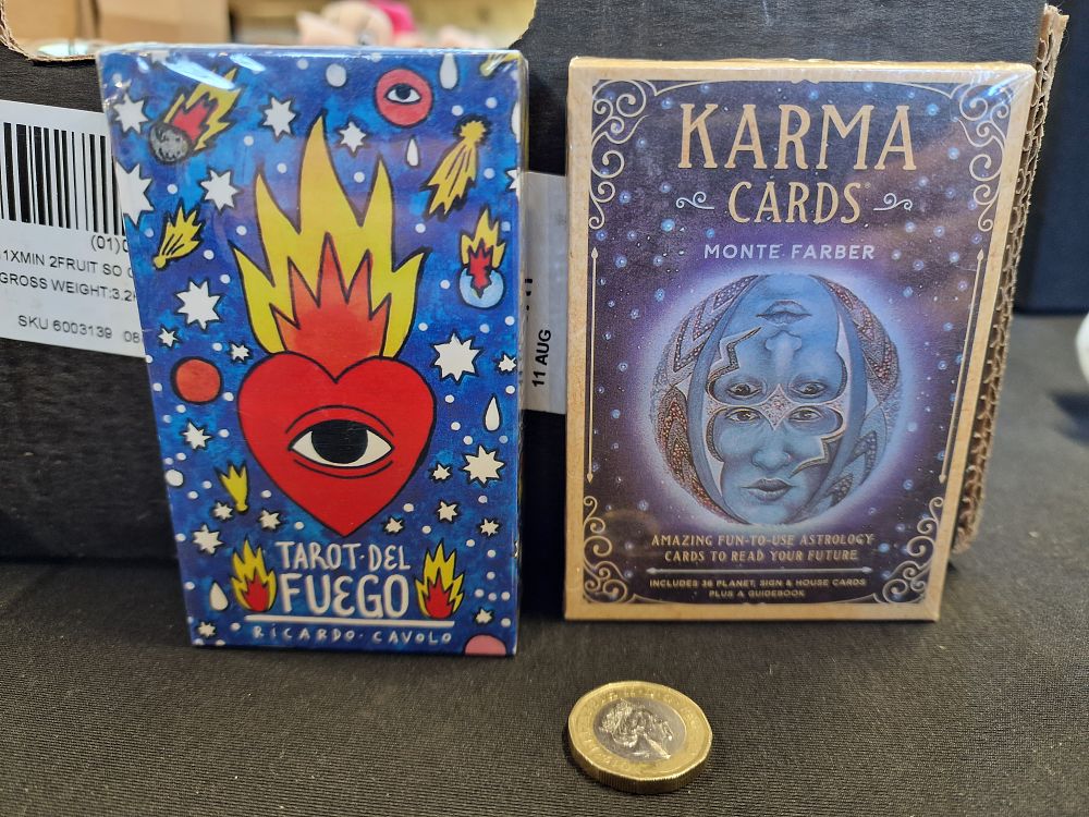 Lot 630: Pair of Tarot Cards. Monte Farber Karma Cards and Ricardo Cavolo Tarot Del Fuego