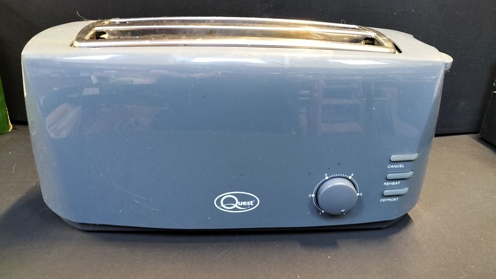 Lot 708: Quest 4 Slice Toaster. Tested for power 