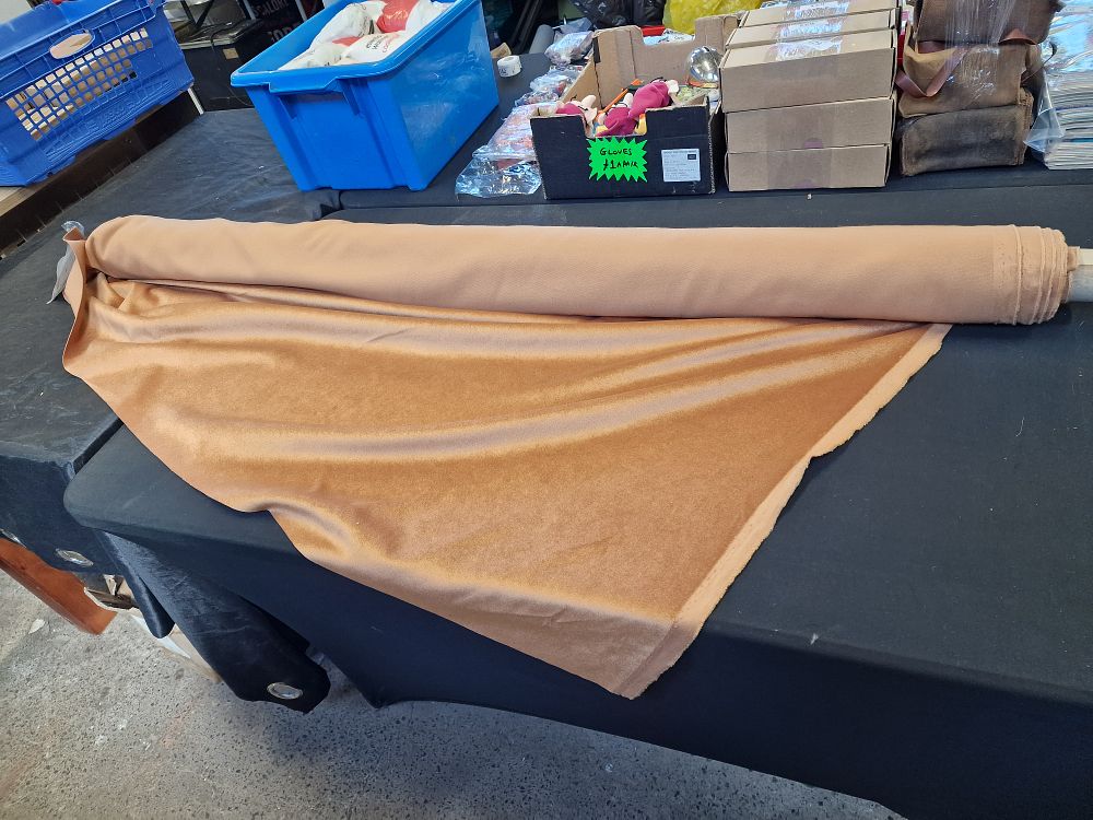 Lot 651: Roll of Material. Cinnamon. Approx 150cm x 4.4mt COLLECTION ONLY