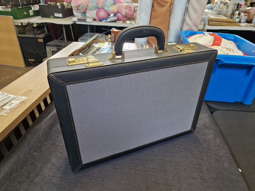 Lot 660: Solo Briefcase. No Code. A Real Life Game of Code Cracker!