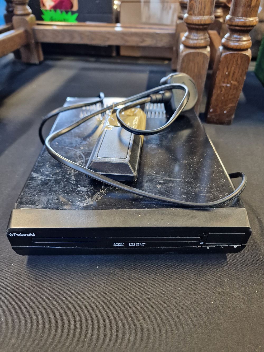 Lot 697: Polaroid DVD Player and Remote