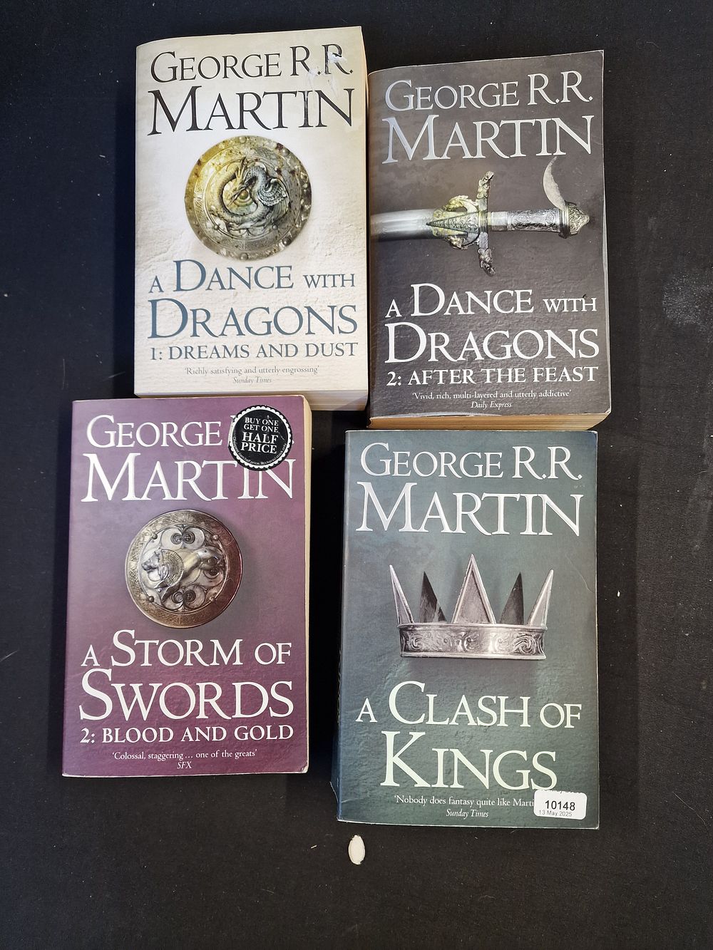 Lot 699: Four George R R Martin Paperbacks
