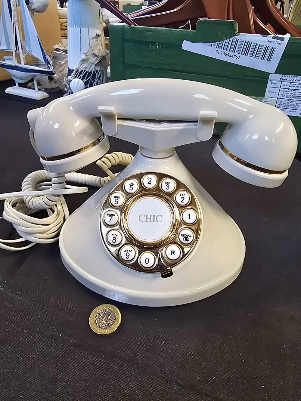 Lot 749: CHIC cream traditional style telephone