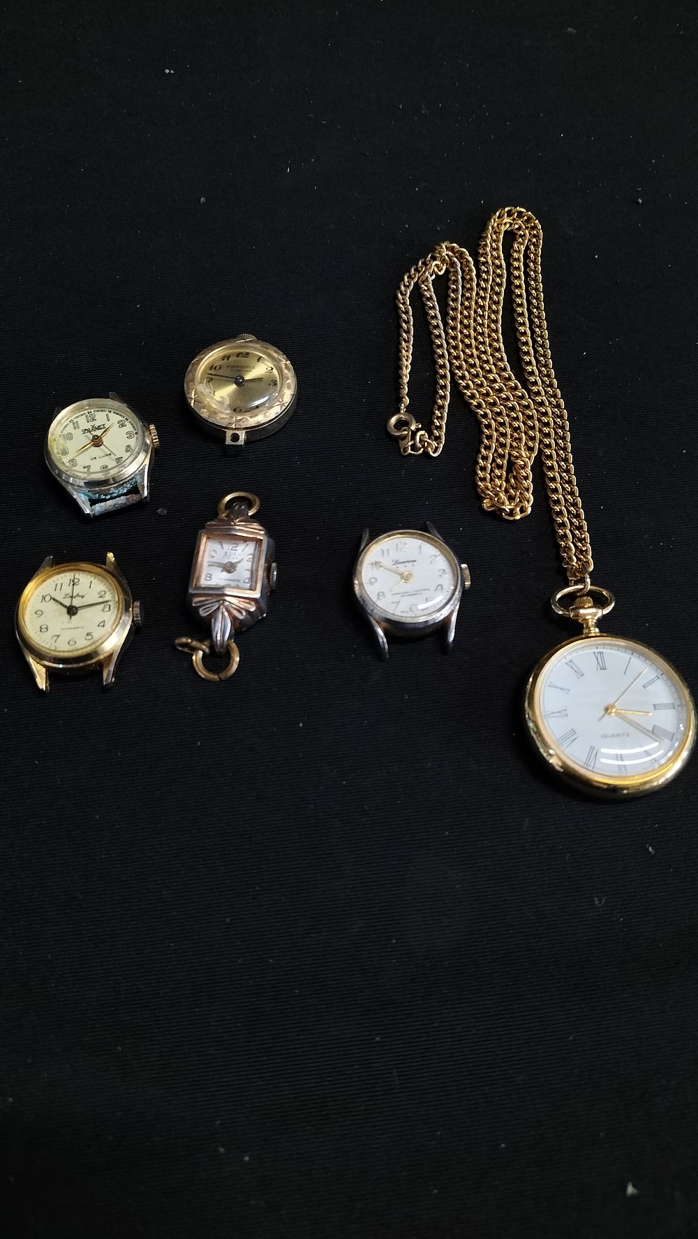 Lot 772: 5 various watch faces without straps. And a...
