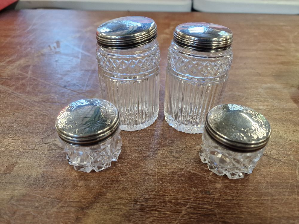 Lot 797: Four Sterling Silver Lid Vanity Cut Crystal Pots