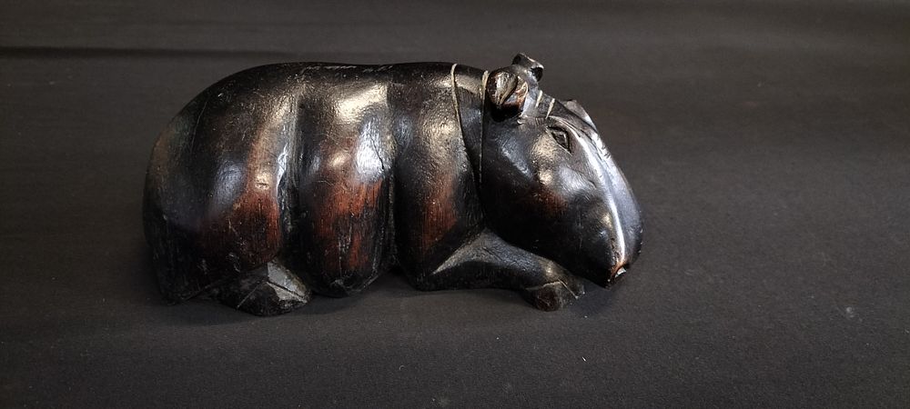 Lot 194: Solid Dark Wood Hippo. Measures approx 7.5 x...