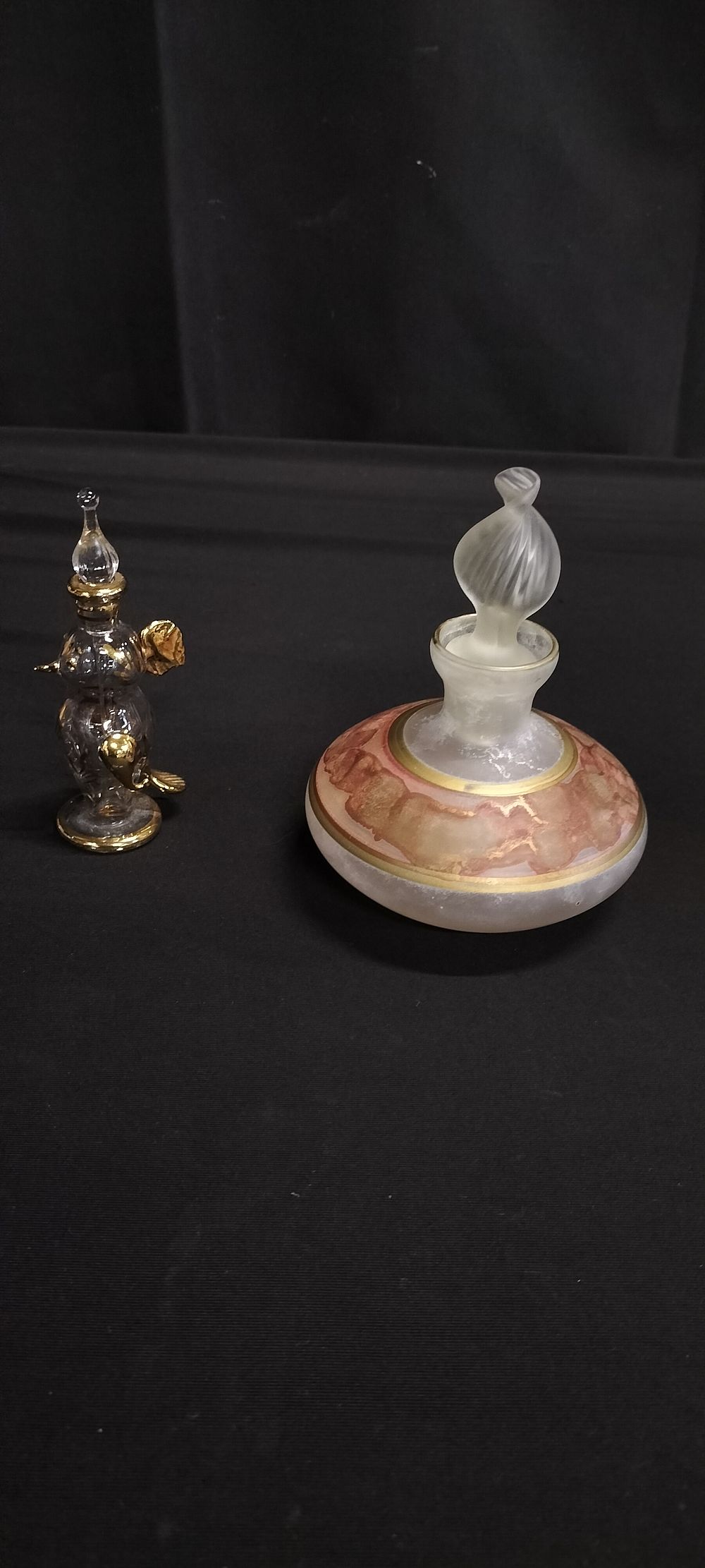 Lot 267: Two Perfume Bottles a Bird. a glazed Pattern...