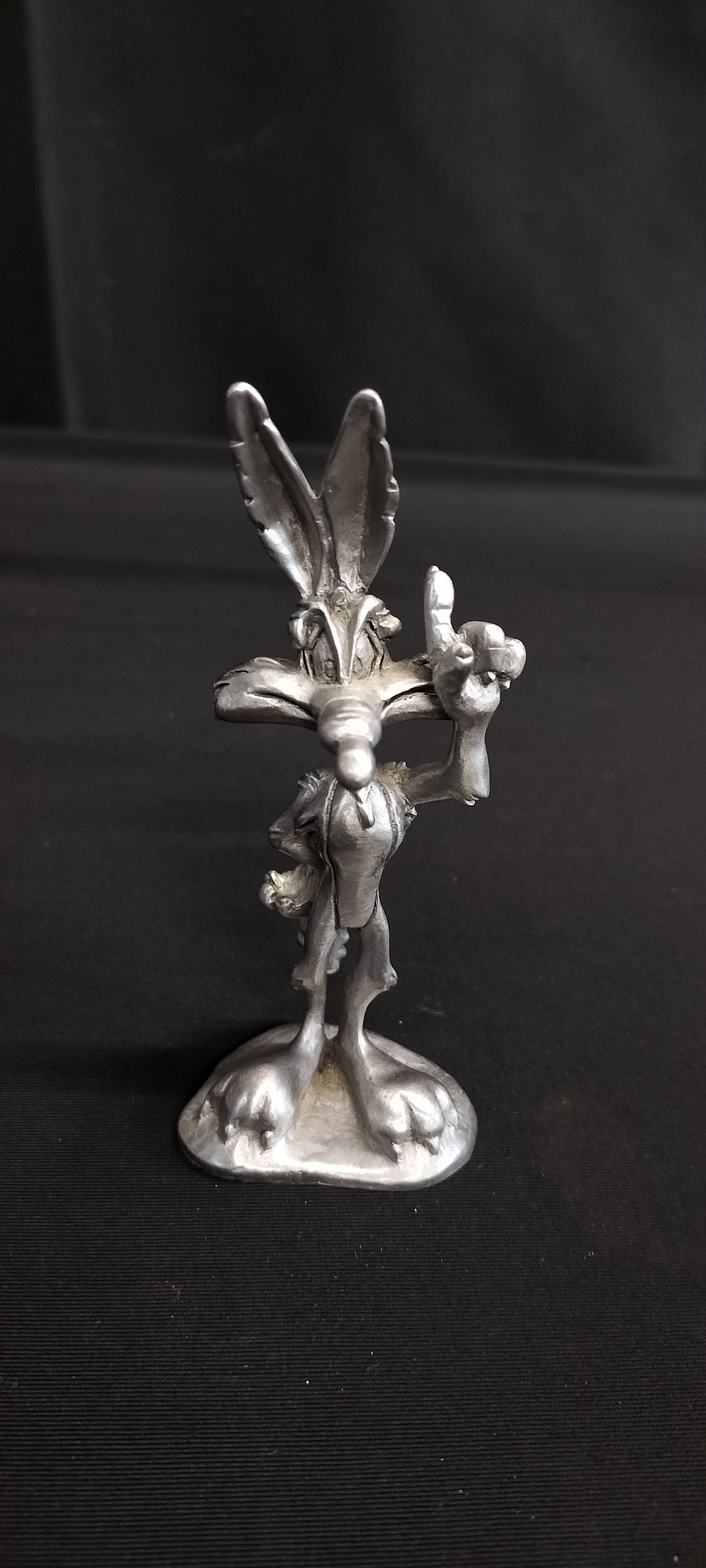 Lot 275: Small1994 Warner Bros Metal Wile.E Coyote Figure. Measures...