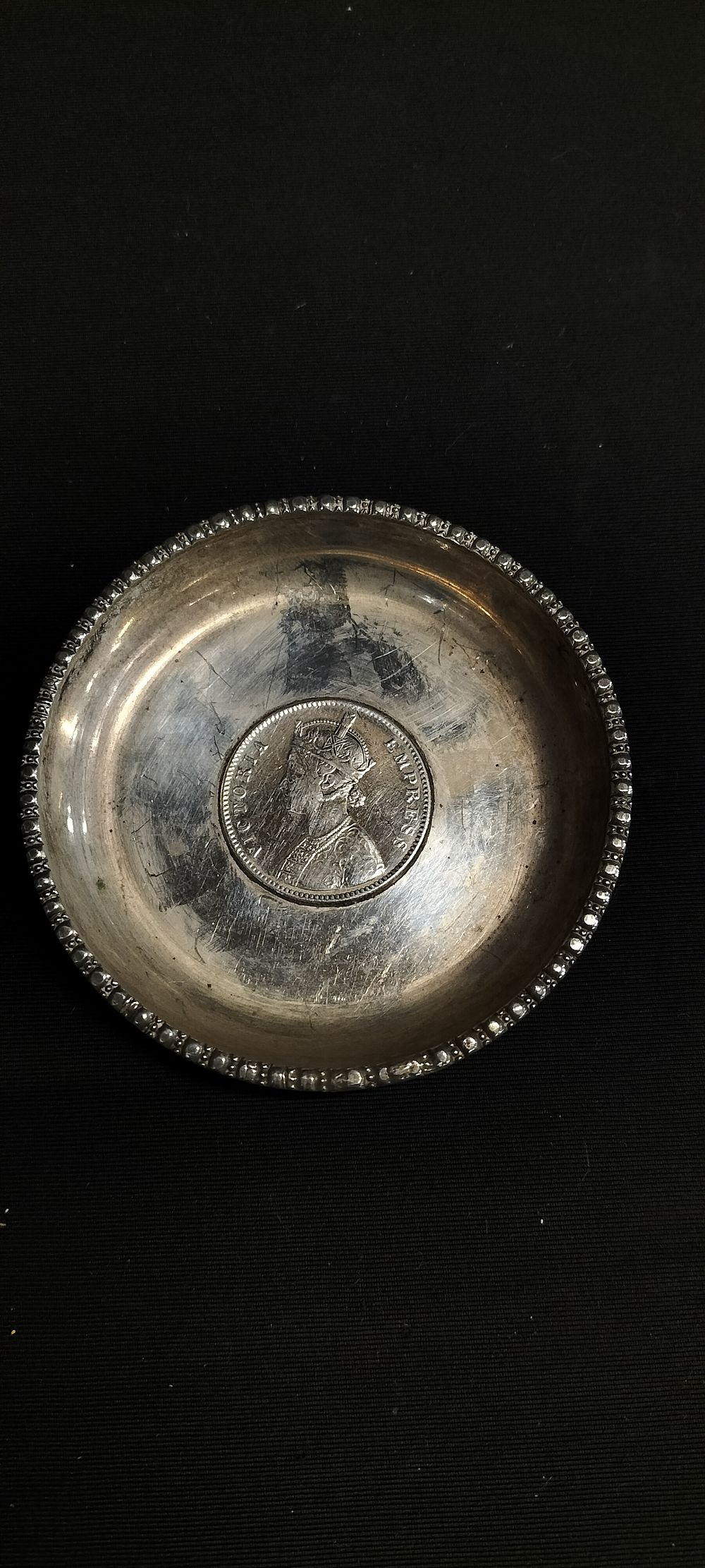 Lot 277: White Metal Dish Inset with Victoria Empress Head...