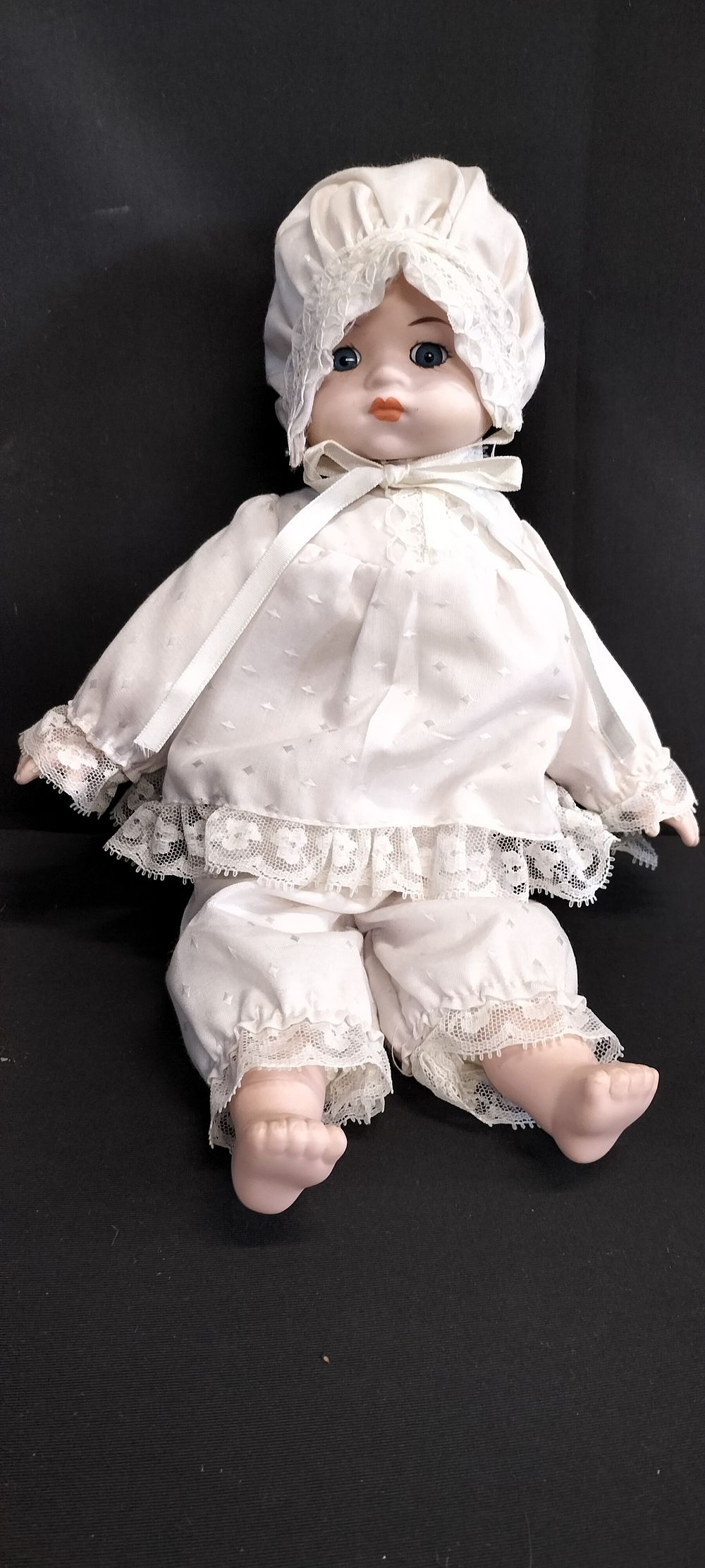 Lot 293: Wind Up Lullaby Porcelain Doll. With Key