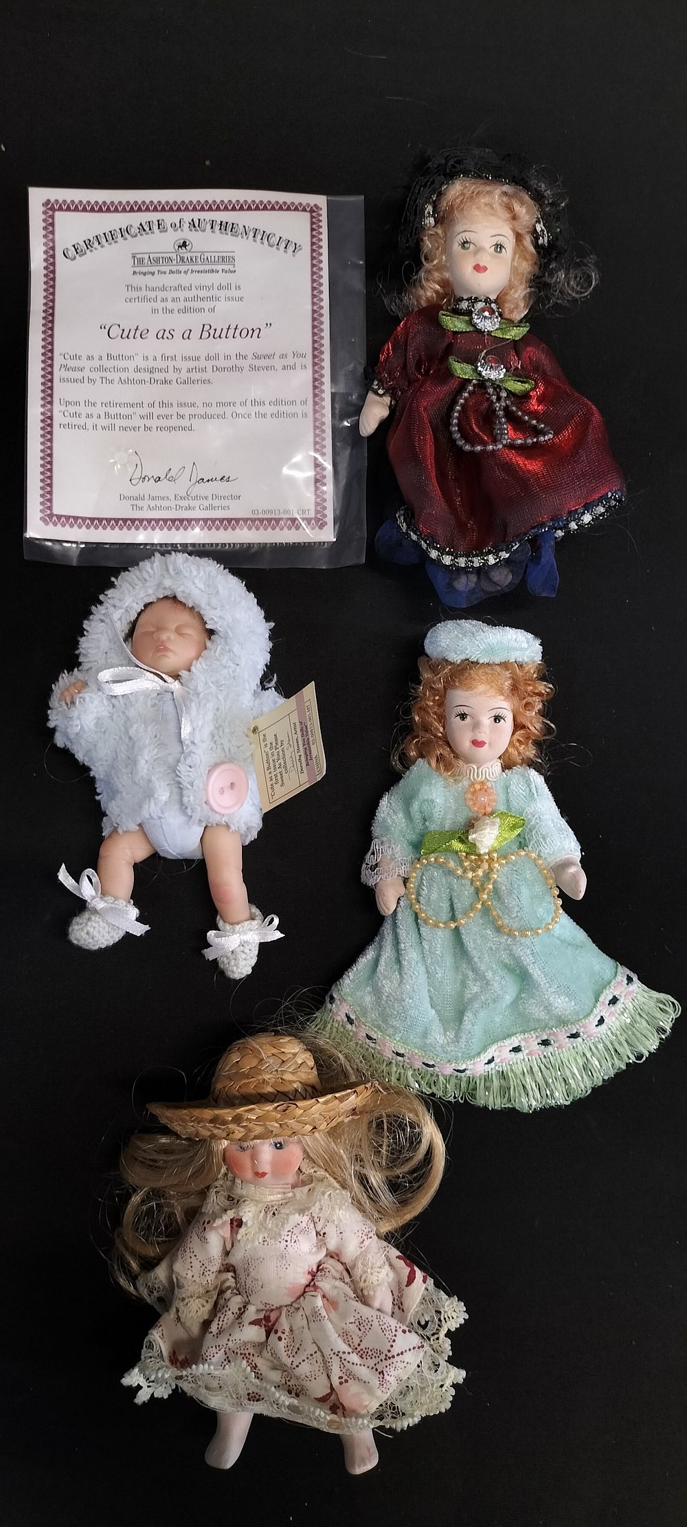 Lot 295: Three Small Porcelain Dolls and a Ashton-Drake Galleries...
